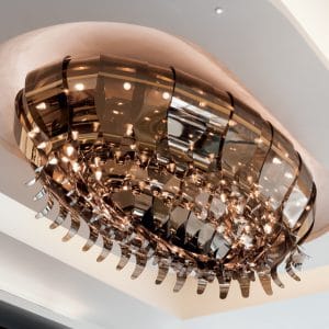 Plated metal and worked glass elements chandelier, contemporary style
